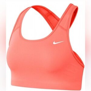 Bright pink Nike sports bra